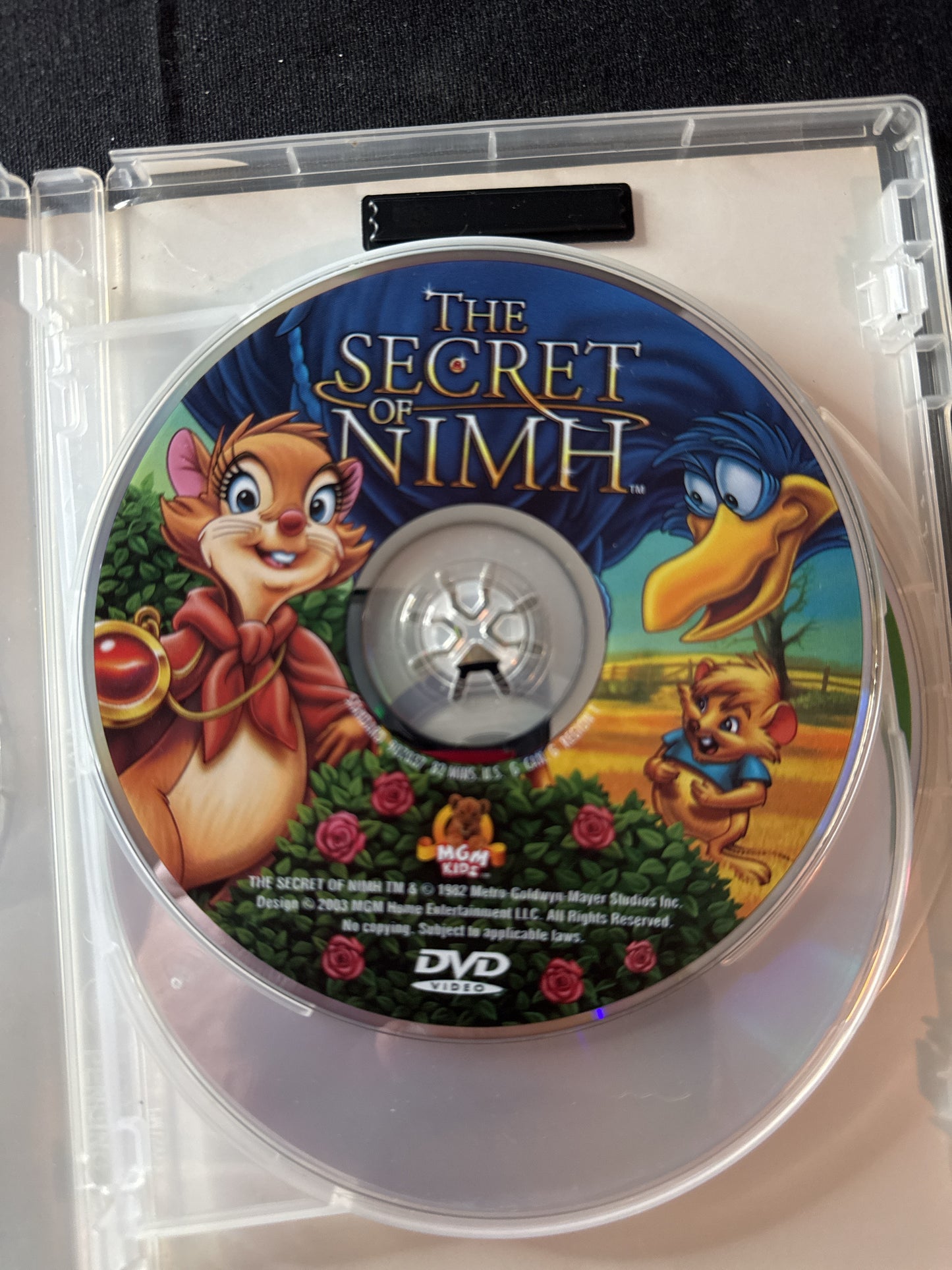 Triple Feature The Care Bears Movie, Hello Kitty Becomes a Princess, The Secret of Nimh DVDs