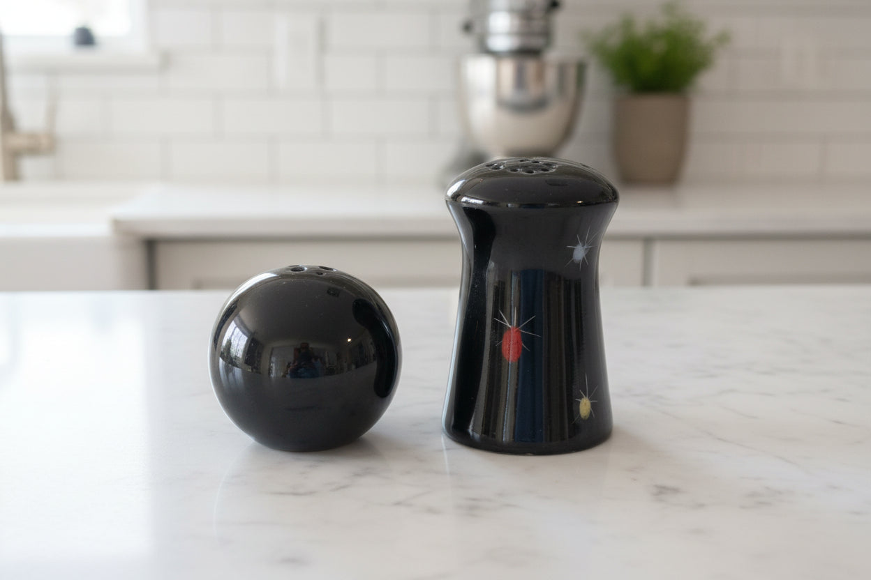 Black Salt & Pepper Shakers Colosseum Ceramic 2.75" Tall Excellent Condition.