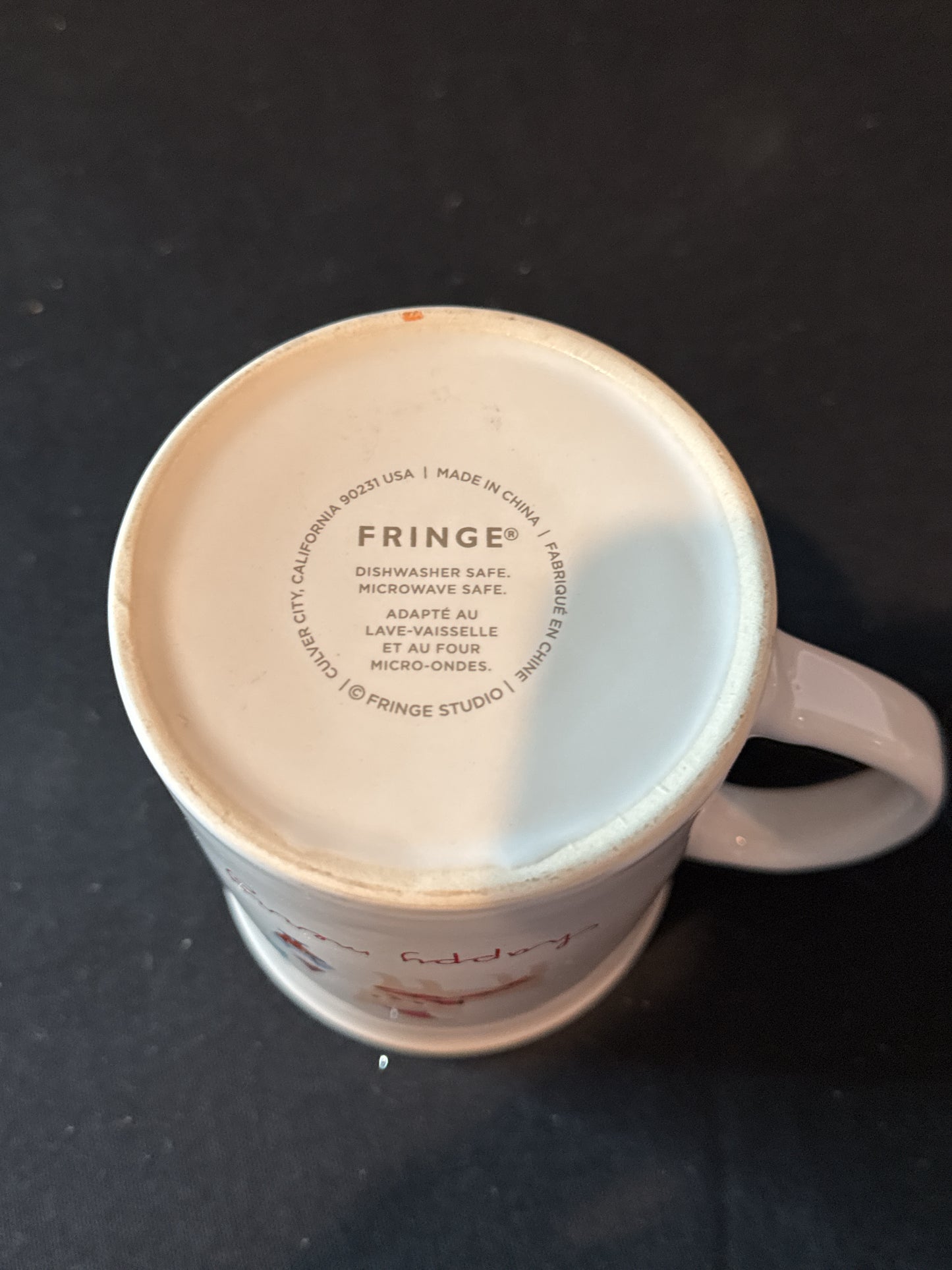 Rare Find - Fringe Happy Merry Coffee Cup Mug Elf Dog Red Interior 4 3/8" Tall