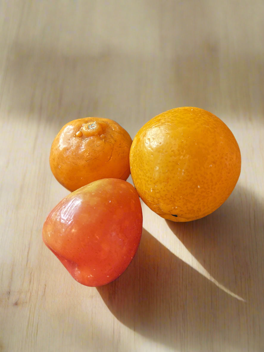 Seven Pieces of Wax Fruit Apples, Oranges, Pear, Apricots, Peaches