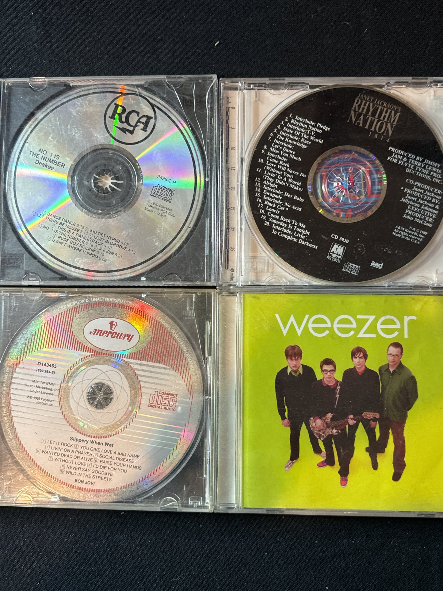 Pop/Rock 4 CDs Weezer, Bon Jovi, Deskee, Janet Jackson