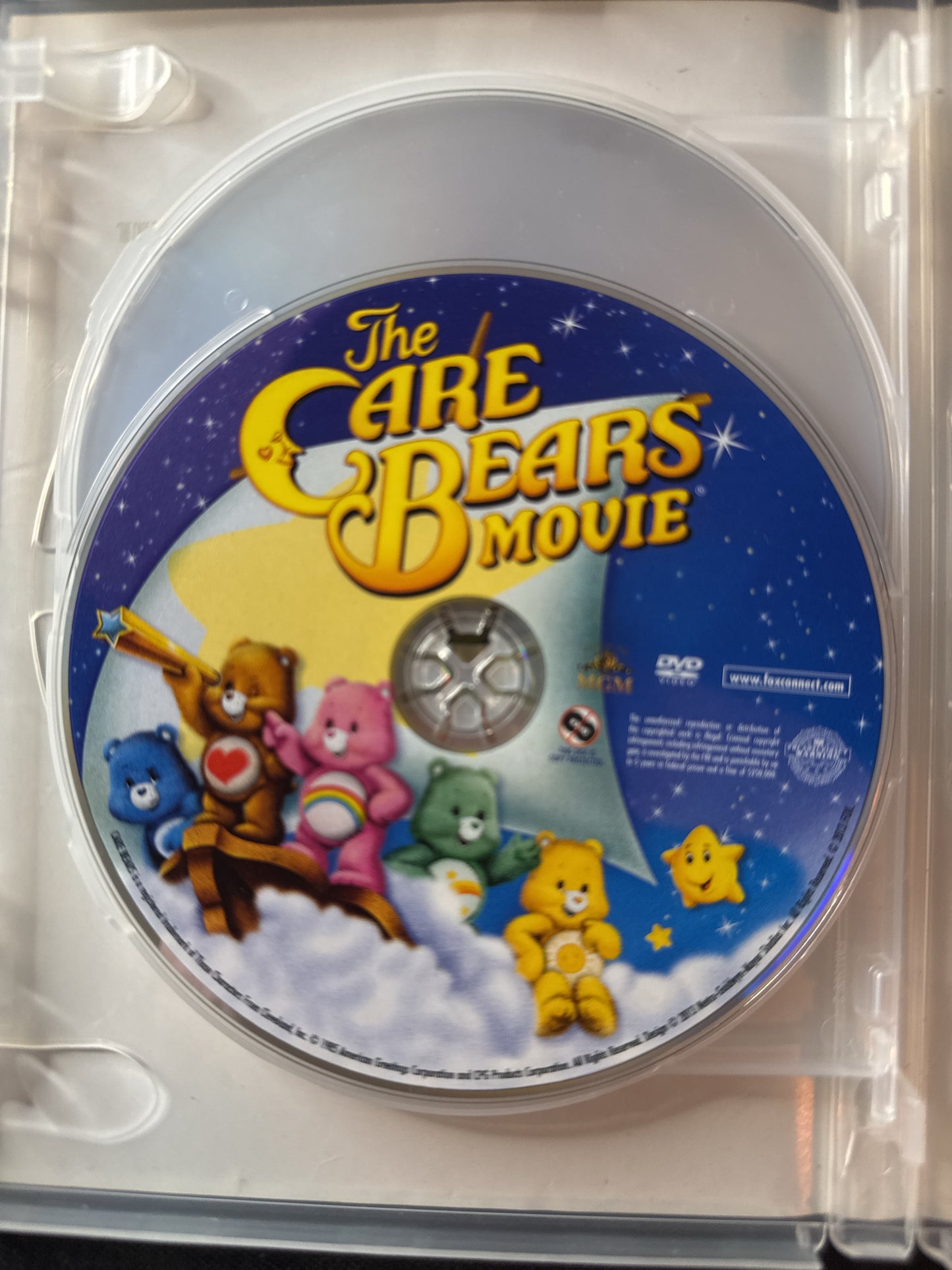 Triple Feature The Care Bears Movie, Hello Kitty Becomes a Princess, The Secret of Nimh DVDs