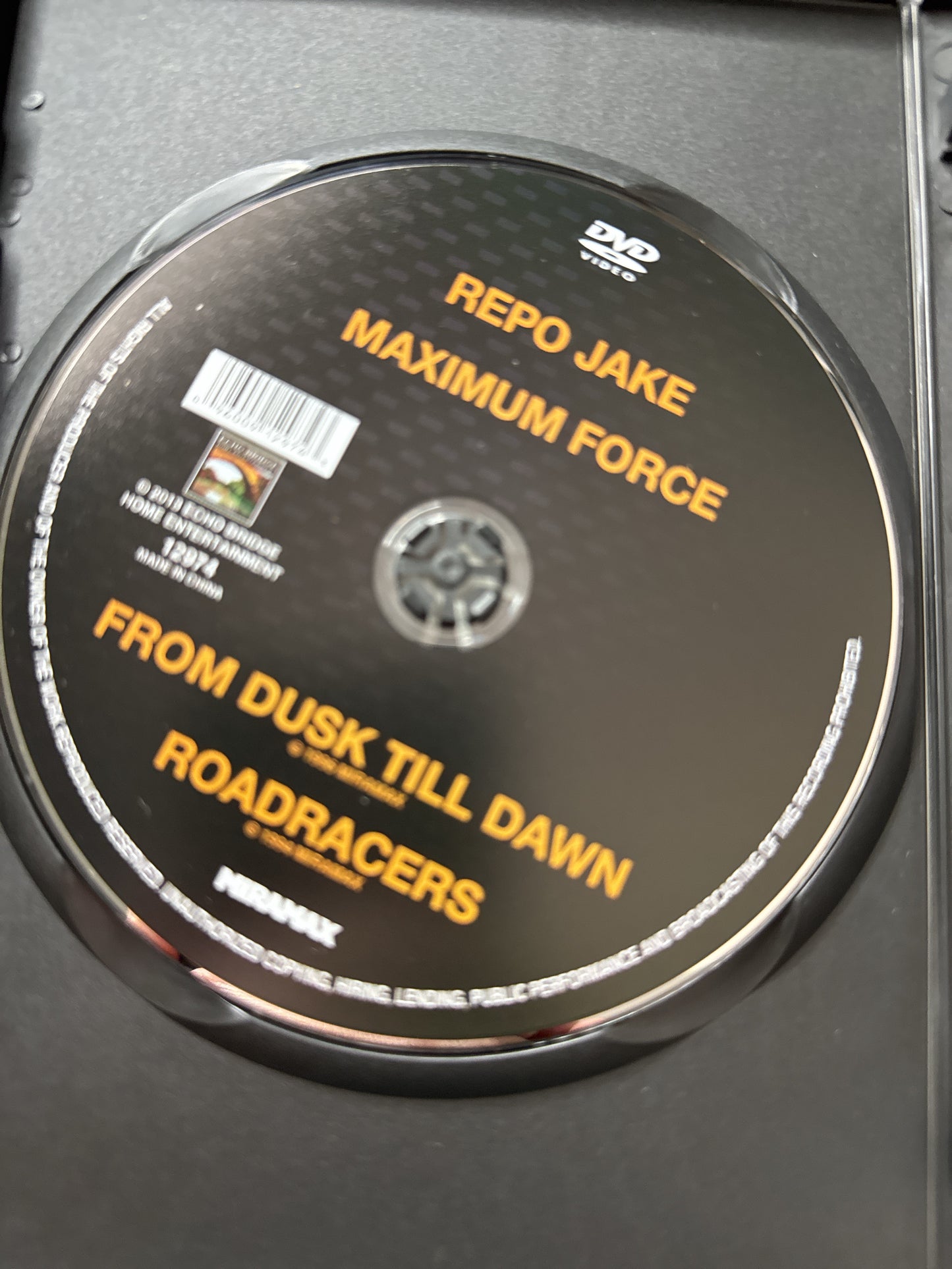 Eight Action Movies: From Dusk to Dawn, Repo Jake, Heist, The Big Man, Roadracers DVDs