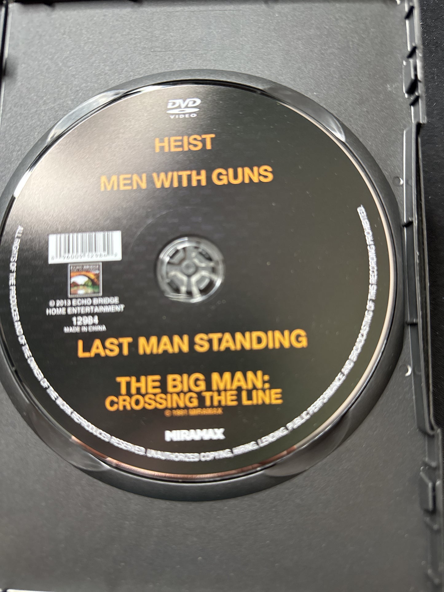 Eight Action Movies: From Dusk to Dawn, Repo Jake, Heist, The Big Man, Roadracers DVDs
