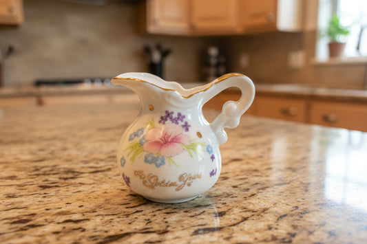 Small Ceramic Creamer Floral Pattern "50 Golden Years" Gold Trim 3.5" Tall