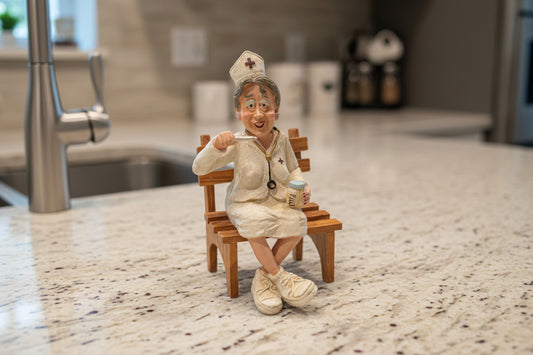 Vintage Russ: Gimmee A Break, Nurse Figurine - Sue Lynn by Doug Harris 6.5" Tall Repaired