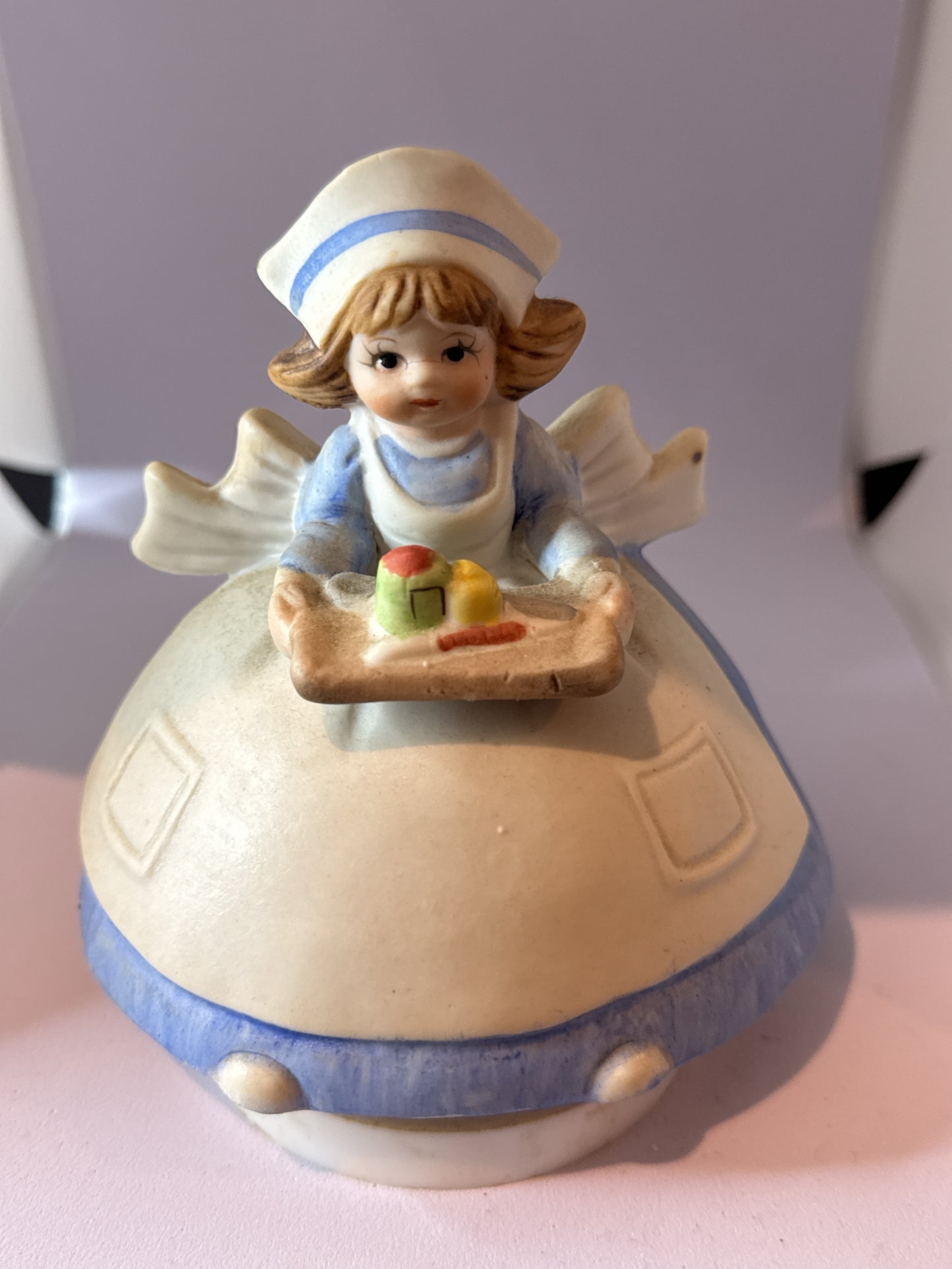 Lefton Vintage Nurse Music Box Spins and Plays "You Light Up My Life" 5" Tall