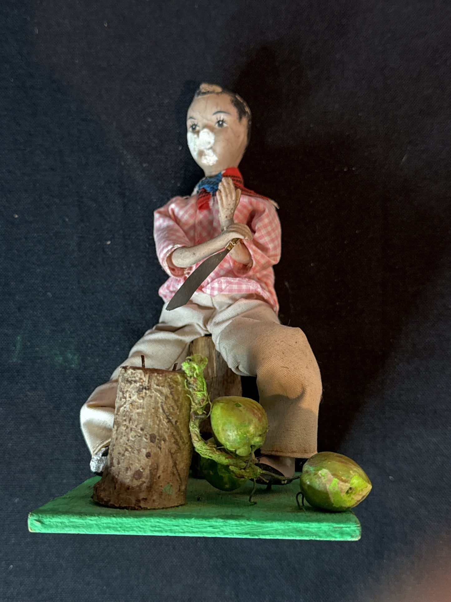 Vintage Folkart Doll Figurine Hand Painted Face Chopping Coconuts. Some Damage