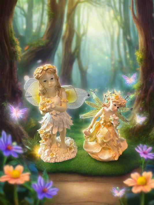 Pair of Pixies/Fairies Figurines One 6" Tall and One. 4" Tall