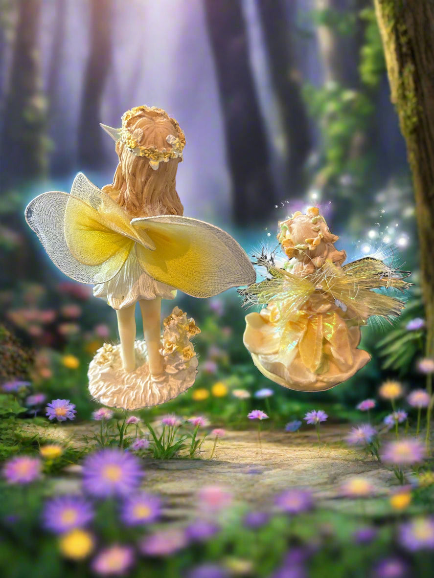 Pair of Pixies/Fairies Figurines One 6" Tall and One. 4" Tall