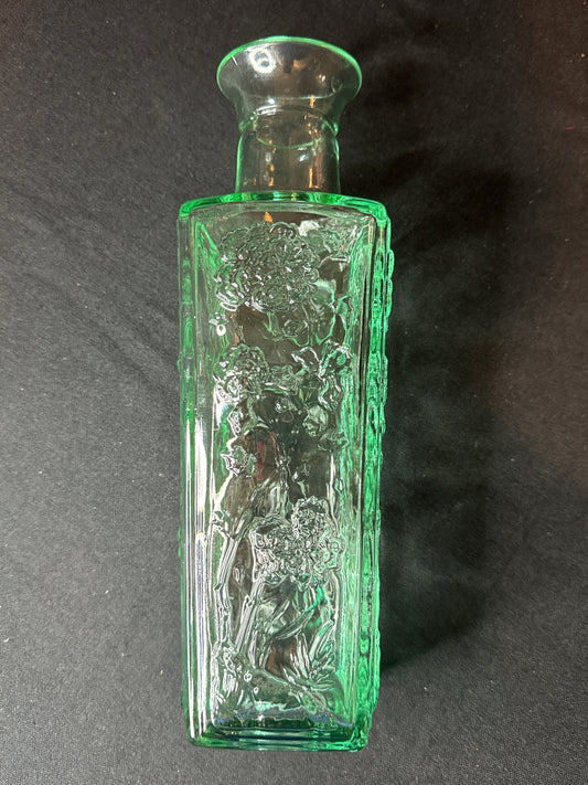 10" Tall Glass Bottle Raised Floral Design Aqua Excellent condition.