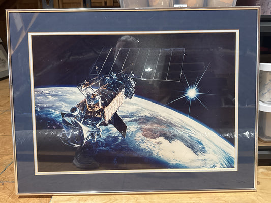Defense Meteorological Satellite Program (DMSP) Above Earth Framed size 28" x 21"