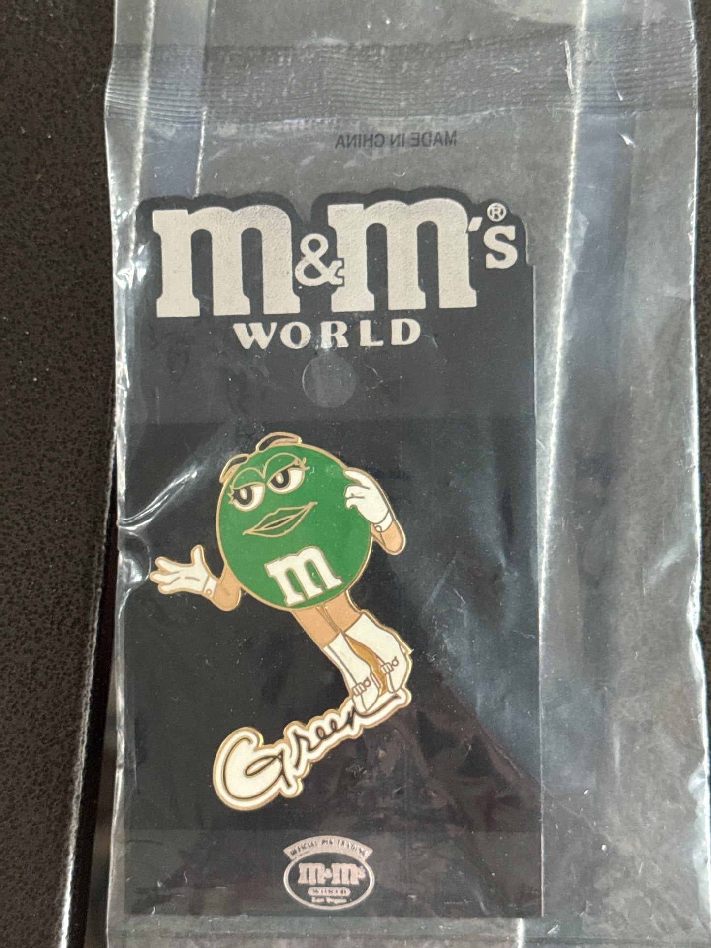Green M&M World Lapel Pin New in Plastic. Very Rare