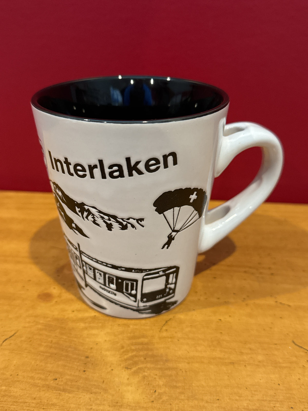 Splash Arts Interlaken Switzerland Souvenir Mug with Black Interior 4.25" Tall